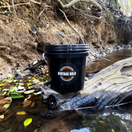 Uncover treasures with the Dirtbag 2Ltr Mini Bucket, packed with small nuggets, flakes, and fine gold of 22 carats purity or higher. Perfect for gold panning enthusiasts seeking adventure and excitement.